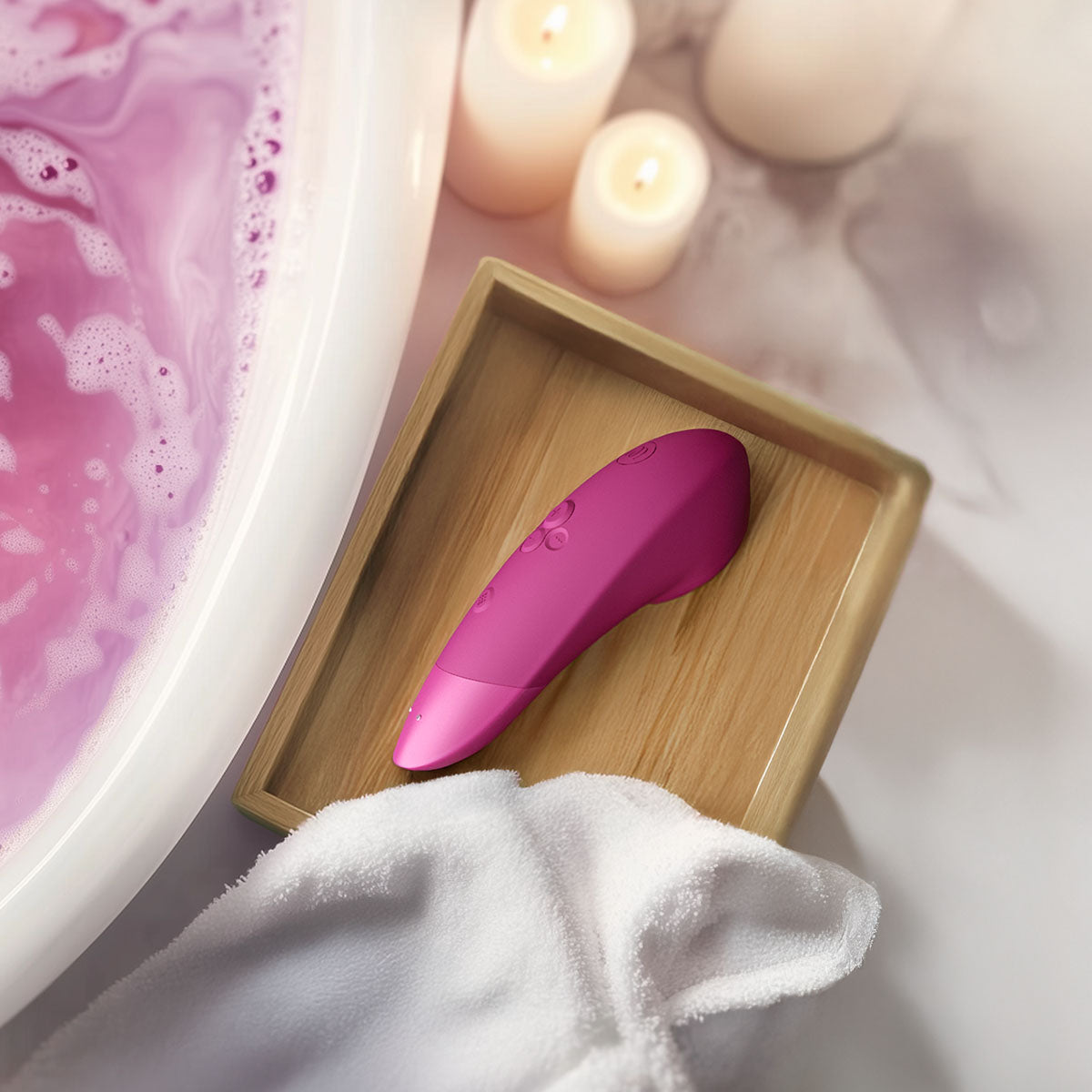Womanizer® Enhance – Rose Vif