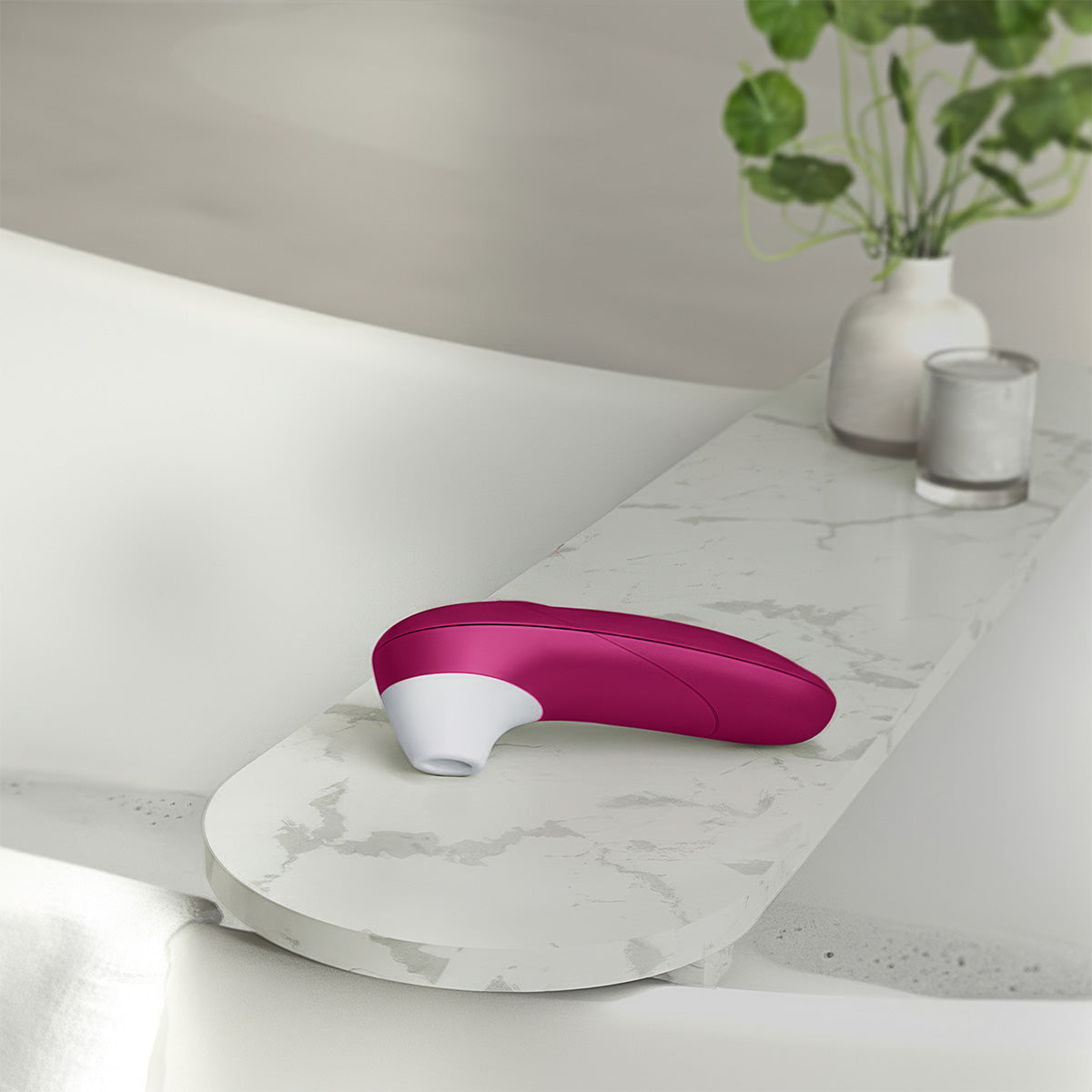 Womanizer Pro – Stimulateur clitoridien – Rose vif